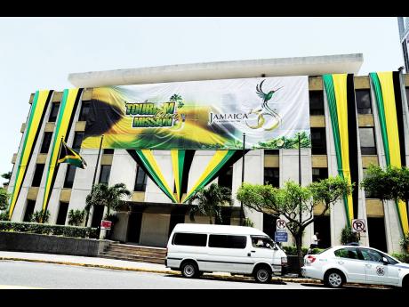 
A banner promotes Jamaica’s tourism sector in this July 2012 file photo. Jamaica’s car rental market is heavily dependent on the health of the hospitality sector.