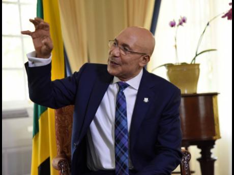 Governor General Sir Patrick Allen gestures during an interview at King’s House on Friday, May 8.