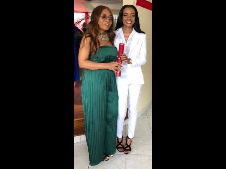 Contributed 
Jodian Fearon (right) celebrating her success with her mom, Portia Green-Haughton, at her graduation ceremony at The University of the West Indies, Mona.