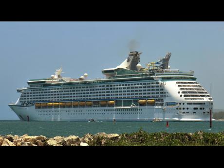 Royal Caribbean Cruise Line’s ‘Adventure of the Seas’ docks in Falmouth on Tuesday. The ship is repatriating more than 1,044 Jamaican crew members.
