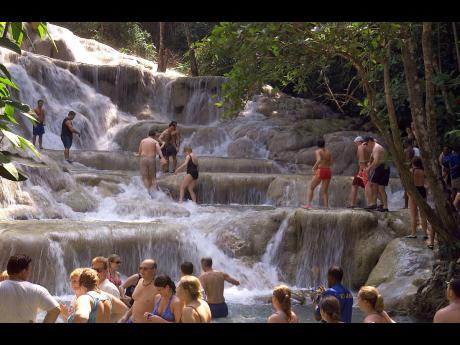 Tourists enjoying the Dunn’s River Falls in Ocho Rios, St Ann.