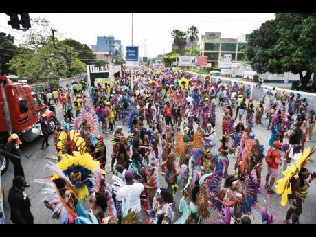  Patrons revel in the sounds of Xaymaca International carnival road march last year.