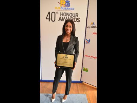 Jamaican sprint star Shelly-Ann Fraser-Pryce with her RJRGLEANER Special Award for Sports, which she received during a luncheon held at The Gleaner’s office on North Street in Kingston in January this year.