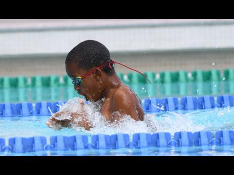 Kai Radcliffe of Queen’s Prep wins the boys 9-10 50m breaststroke in a meet record 40.17 seconds at the Mayberry Preparatory/Primary swim meet held at the National Aquatic Centre recently.