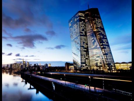 AP Photos 
The European Central Bank sits next to the river Main in Frankfurt, Germany. 