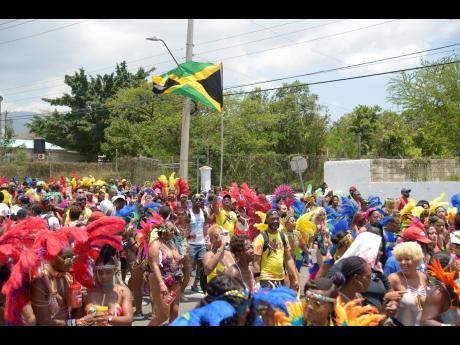 Revellers fêting along the Xodus Jamaica Carnival route on Sunday April 28, 2019.