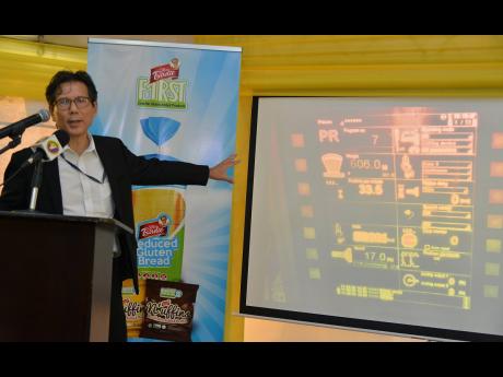 File 
Anthony Chang, managing director of Consolidated Bakeries Jamaica/Purity Bakery, speaks at the launch of the Miss Birdie line of gluten-free products in June 2019.
