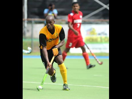 Jamaica’s senior men’s hockey team in action during a CAC Games qualifier at the Mona Hockey Field on Sunday, November 5, 2017.