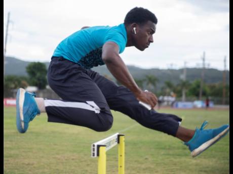 Jamaica College athlete Jahiem Stern going through hurdling drills at the Ashenheim Stadium on Thursday, February 20.