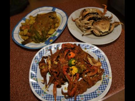 From left (back row) : D85 Lounge presents its curried fish, boiled crab and curried sea crab (in front).