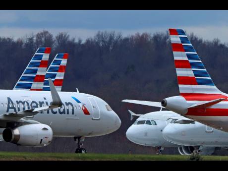 AP
In this March 31, 2020 photo, American Airlines planes are parked at Pittsburgh International Airport in Imperial, Pennsylvania.