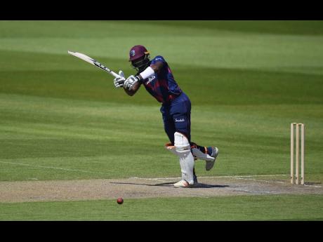Shamarh Brooks plays a shot during day three of a West Indies warm-up match at Old Trafford in Manchester, England, on Thursday.