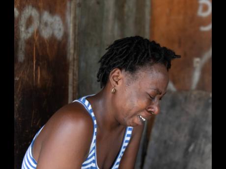 Jacqueline Dunkley is overcome with grief as she recalls getting news of the fatal shooting of her son, Andre Dixon, on  Friday, July 4, 2020, at the intersection of Beckford and Pechon streets in downtown Kingston. Dixon would have celebrated his 17th bir