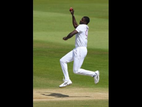 Windies captain Jason Holder bowls a delivery during the fifth day of the first Test match against hosts England at the Ageas Bowl in Southampton on Sunday.