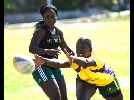 Members of the Jamaica Rugby Union Lady Crocs team participating in a training session at Emmet Park on Saturday, June 29, 2019.