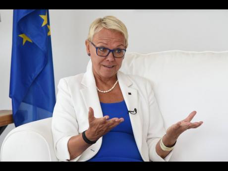European Union Ambassador Malgorzata Wasilewska gestures during an interview with The Gleaner recently. 