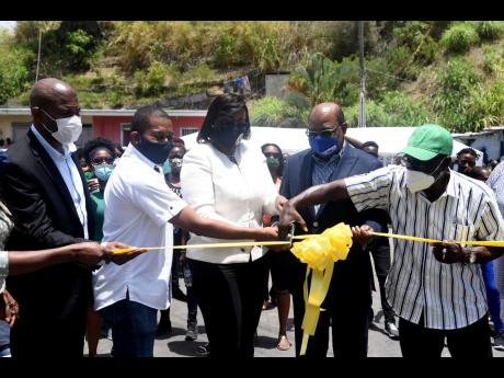 From left: Varden Downer, senior director at the National Works Agency; Floyd Green, state minister in the Ministry of Industry, Commerce, Agriculture and Fisheries; Juliet Holness, member of parliament for East Rural St Andrew; Edmund Bartlett, minister o