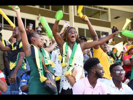 Supporters of the Jamaica Tallawahs celebrate their team’s first win of the 2019 Caribbean Premier League campaign after they defeated the Barbados Trident at Sabina Park on Sunday, September 15, 2019.