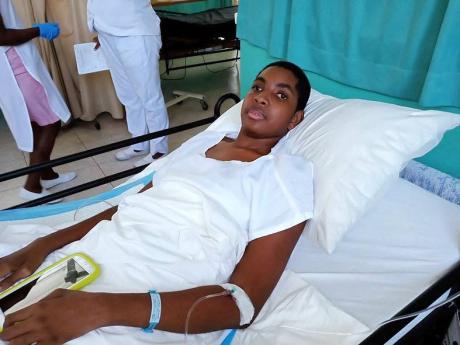 Cornel Grant, 16, before undergoing a successful surgery to remove tumours from his spine on Wednesday.