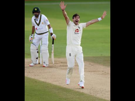 England’s James Anderson appeals successfully for the wicket of Pakistan’s Babar Azam during the second day of the third Test match between England and Pakistan, at the Ageas Bowl in Southampton, England, on Saturday.