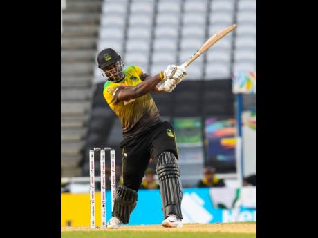 Jamaica Tallawahs all-rounder Andre Russell hits a six during the Hero Caribbean Premier League match eight between Guyana Amazon Warriors and Jamaica Tallawahs at Brian Lara Cricket Academy in Trinidad and Tobago on Saturday.