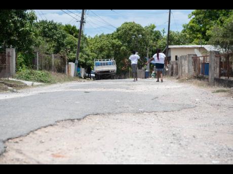 One of many deplorable roads in Hayes, Clarendon, in need of attention.