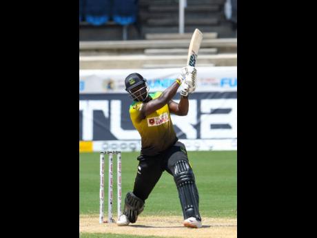 Andre Russell of Jamaica Tallawahs hits a 4 during the Hero Caribbean Premier League match between Jamaica Tallawahs and Trinbago Knight Riders at Brian Lara Cricket Academy yesterday in Tarouba, Trinidad and Tobago.