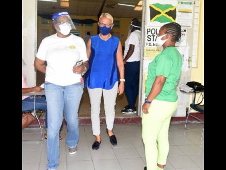 Ambassador Malgorzata Wasilewska, head of the Delegation of the European Union to Jamaica leaves the polling station in Stony Hill, Western St Andrew after conducting a brief observation of the voting procedure. 