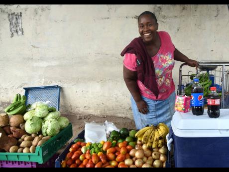 Nadine Baker is a vendor along Bay Farm Road. “The JLP people look more like dem want to help the people, so that would be good,” she said.
