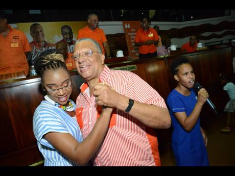 PNPYO President Krystal Tomlinson, seen here dancing with party President Dr Peter Phillips on March 25, 2020, had led a mini rebellion in April 2019 for an overhaul of the PNP ahead of a general election. Tomlinson and party elders appeared to have made p