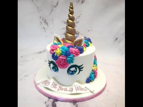 An elaborately decorated birthday cake.