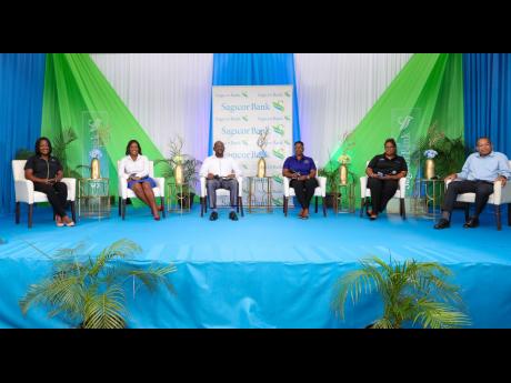 Panellists at the recently held Sagicor Bank Financial Enrichment Session. Sagicor Bank Jamaica representatives Nikesha Bonnick-Magnus (left), assistant manager – branch operations; Kerrian Forrester (second left), mortgage officer; Clinton Hunter (third