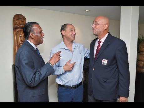 Cricket West Indies (CWI) President Ricky Skerritt (right) shares a light moment with Wilford ‘Billy’ Heaven (left), Jamaica Cricket Association president, and Don Wehby, Group CEO of GraceKennedy and chairman of CWI’s Corporate Governance Committee,