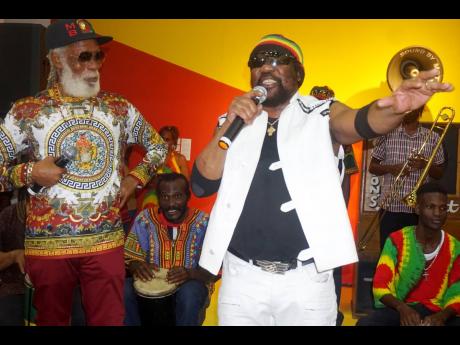 Big Youth (left) and Toots share the stage at the opening  of the ‘Jamaica Jamaica’ exhibition at the National Gallery on February 2, 2020.   