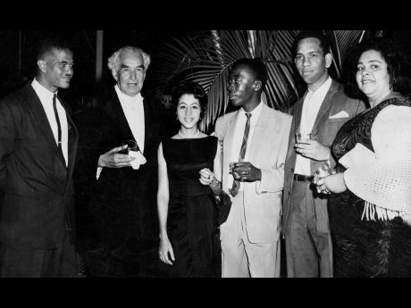Sir Alexander Bustamante (second left) with members of the Guild Council of The University of the West Indies, who were among his guests at the reception at Vale Royal for then Prime Minister of Trinidad and Tobago Dr Eric Williams. From left: Selvyn Walte