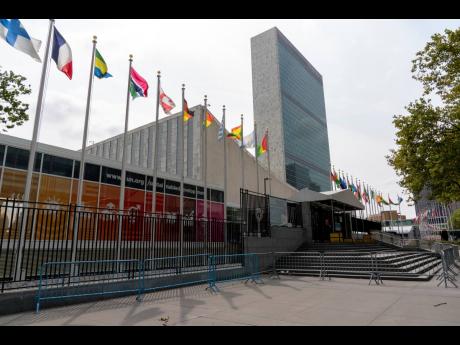 Metal barricades line the shuttered main entrance to the United Nations headquarters in New York on Friday. Security measures have been downscaled outside the United Nations ahead of this year’s General Assembly. As the COVID-19 pandemic continues to wre