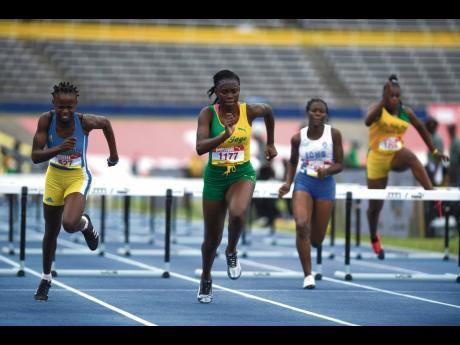 Action from the Class Three Girls 80m hurdles event at the ISSA/GraceKennedy Boys and Girls’ Athletics Championships at the National Stadium on Tuesday, March 26, 2019.