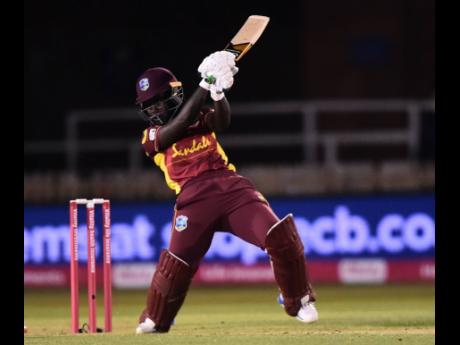 Windies Women batter Deandra Dottin in action against England Women during their first Twenty20 International in their five-match series at the County Ground in Derby, England, yesterday.