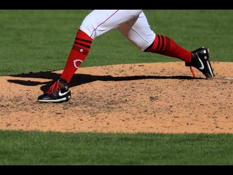 A view of the Nike Air Jordan 1 cleats worn by Cincinnati Reds’ Archie Bradley during a baseball game against the Chicago White Sox in Cincinnati on Sunday, September 20, 2020.