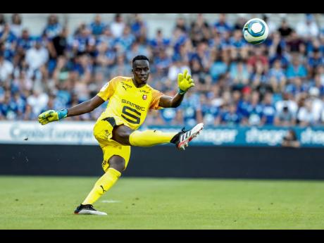 In this file photo from August 2019, Rennes’s goalkeeper Edouard Mendy punts the ball during their Ligue 1 match against Strasbourg in Strasbourg, Eastern France.