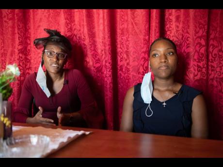 Esther Thomas (right) and her mother, Keisha Ann Thomas, assistant pastor of the Pentecostal Gospel Showers church in Riverton City, discuss the disappointment of Esther not being accepted by The UWI to study medicine. 