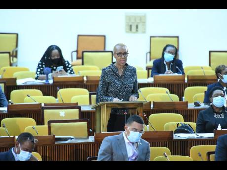 Fayval Williams, minister of education, makes an address during a sitting of the House of Representatives at the Jamaica Conference Centre in Kingston on Tuesday.