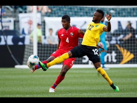 Junior Flemmings (right) in action for Jamaica during a Concacaf Gold Cup match against Panama in Philadelphia, Pennsylvania, on Sunday, June 30, 2019.
