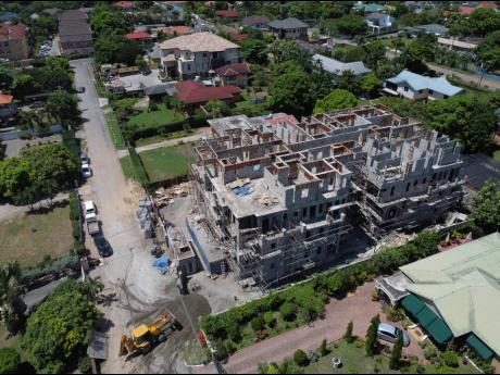 An aerial view of the construction of a multifamily dwelling at 9 Evans Avenue in St Andrew