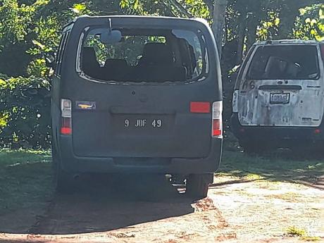 This Jamaica Defence Force service vehicle was damaged during the shootout.