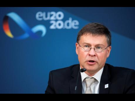 AP 
Valdis Dombrovskis, vice-president of the EU Commission, speaks at a press conference in Berlin, Germany, following the informal talks of the EU Trade Ministers on Monday, September 21.  
