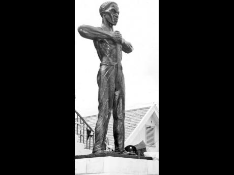 Statue of Paul Bogle, erected in front of the Morant Bay Courthouse. 