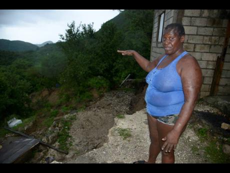 Gaylia Catwell said that she is afraid to sleep in her house after a landslide claimed much of her backyard in Lindo’s Gap, St Andrew, on Sunday. 