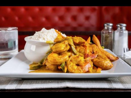 If you love curry and shrimp, tantalise your tastebuds with the scrumptious curried shrimp, served with white rice and steamed vegetables.