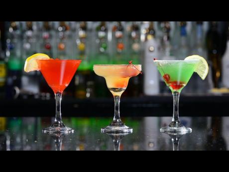 If drinks are your speciality, cheers with this intoxicating trifecta. From left: Cosmopolitan, Hennessy Margarita and Apple Martini. 